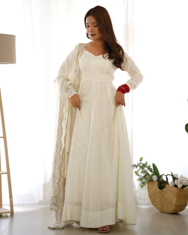 Divine Off White Colored Heavy Roman Silk Chanderi Anarkali Gown
