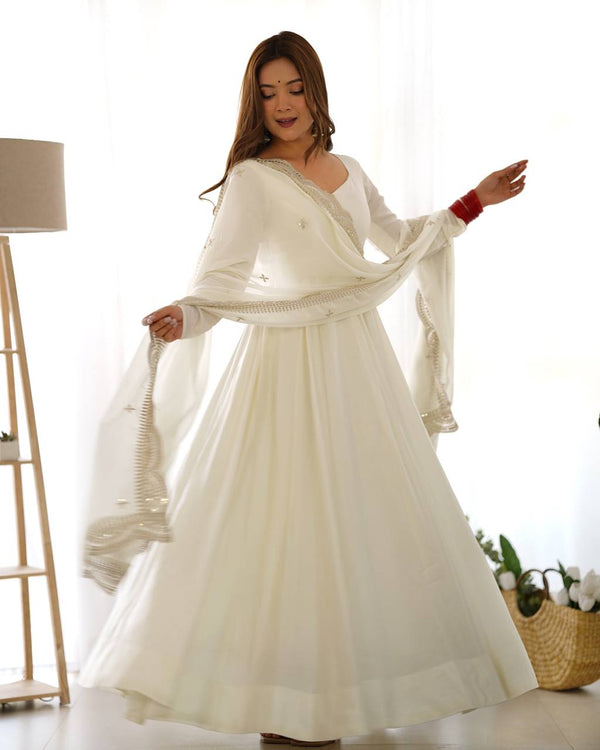 Divine Off White Colored Heavy Roman Silk Chanderi Anarkali Gown