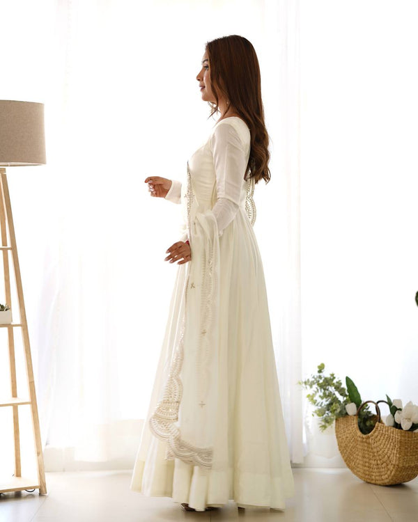 Divine Off White Colored Heavy Roman Silk Chanderi Anarkali Gown