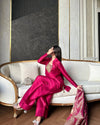 Vision of Confidence in a Stylish Pink Suit