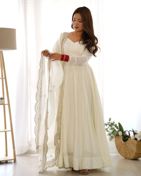 Divine Off White Colored Heavy Roman Silk Chanderi Anarkali Gown