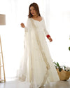 Divine Off White Colored Heavy Roman Silk Chanderi Anarkali Gown